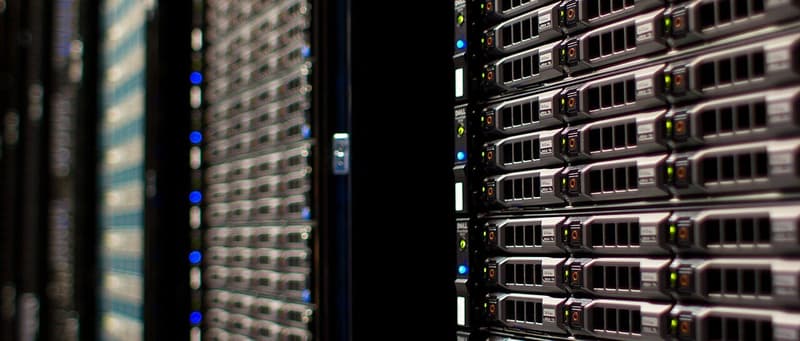Rows of server racks inside a data center