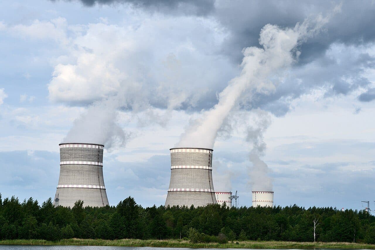 Cooling towers of a nuclear power plant against a blue sky