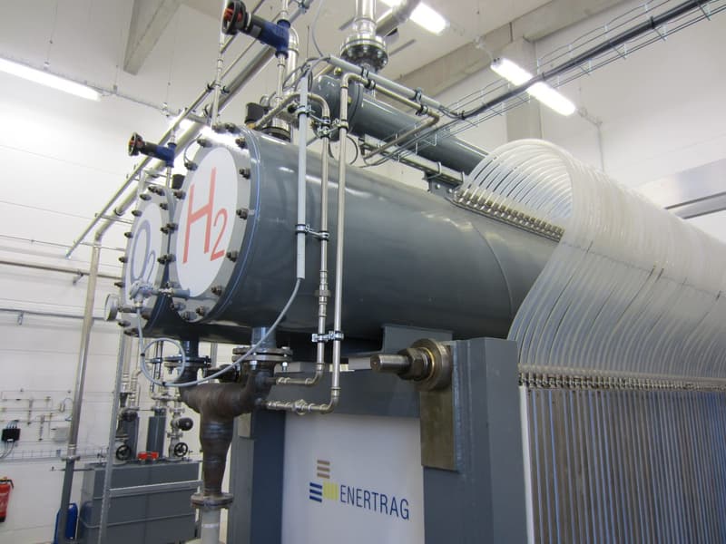 Industrial electrolysis unit with H2 and O2 gas separator drums inside a green hydrogen facility