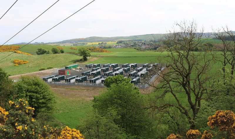 Battery storage containers at the Hunterston Battery Storage Facility in Scotland