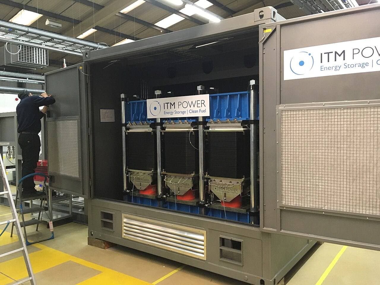An ITM Power electrolyser module being assembled — industrial equipment of the type Hynamics operates for low-carbon hydrogen production