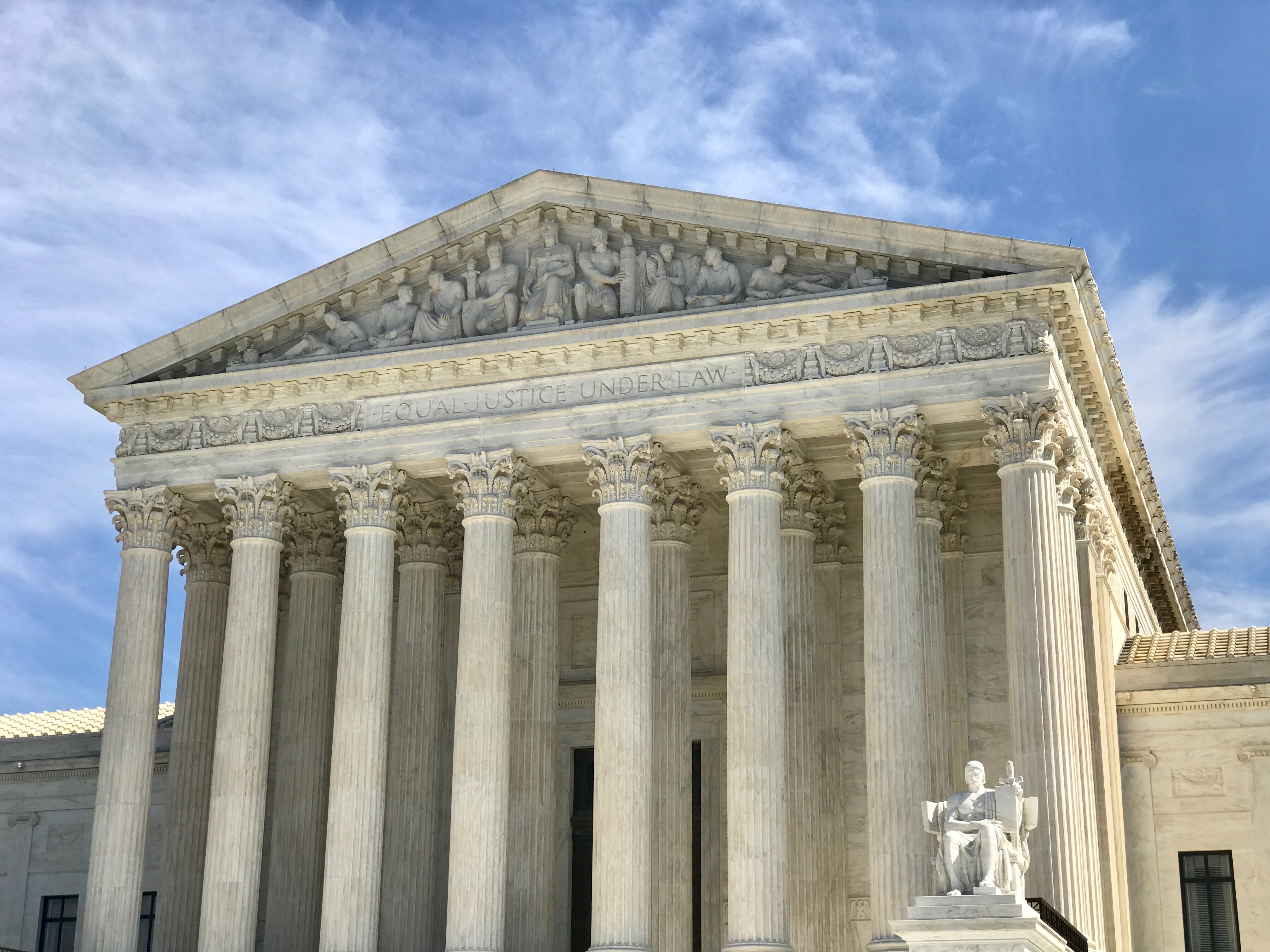 The U.S. Supreme Court building facade inscribed 'Equal Justice Under Law' (illustrative image of the federal court system)