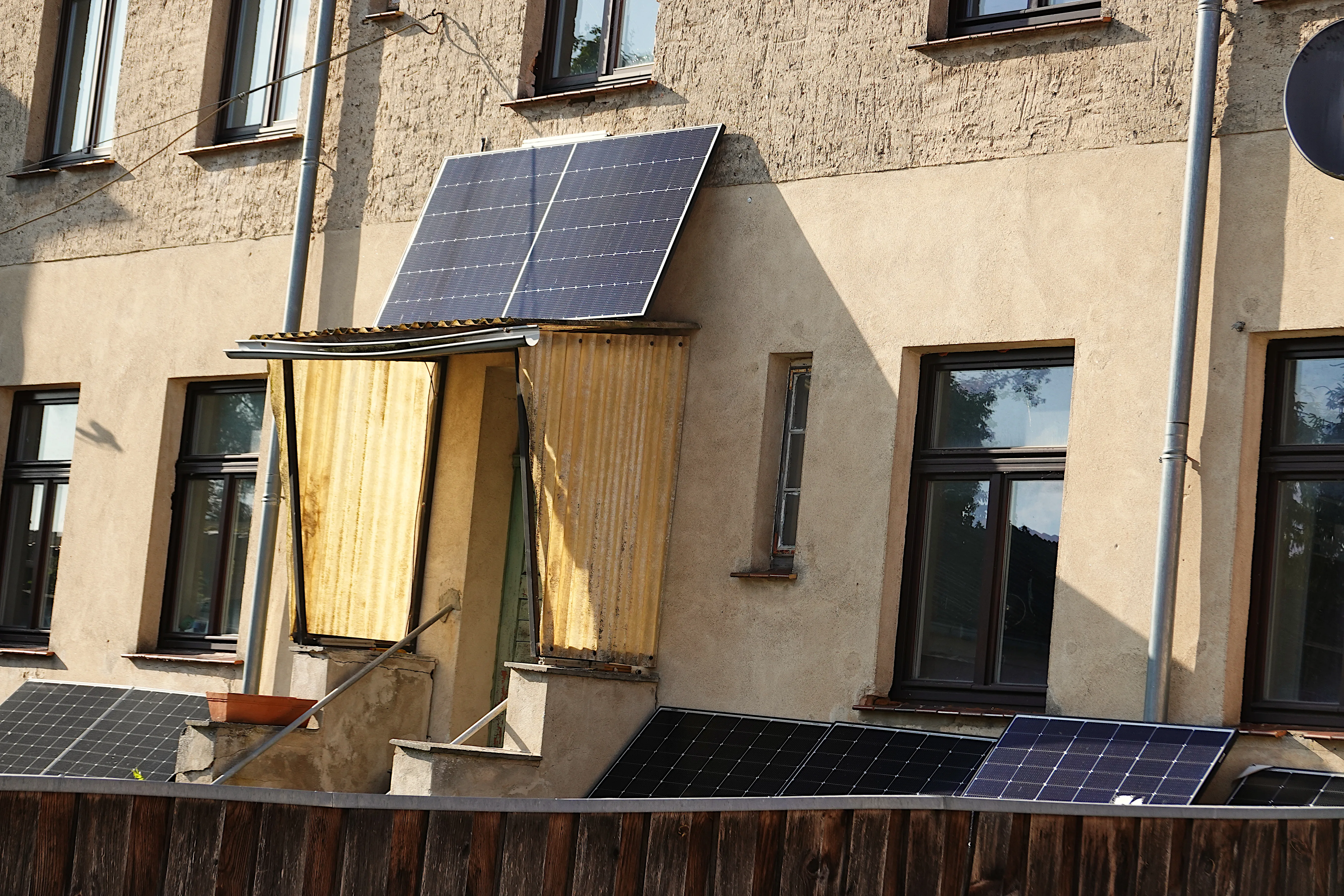 Plug-in balcony solar panels mounted on a railing