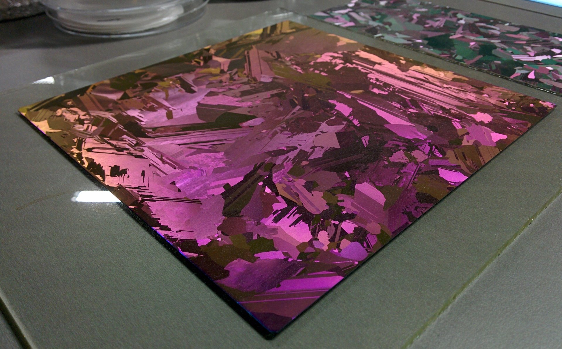 A multicrystalline silicon wafer with an anti-reflective thin-film coating (illustrative photo)