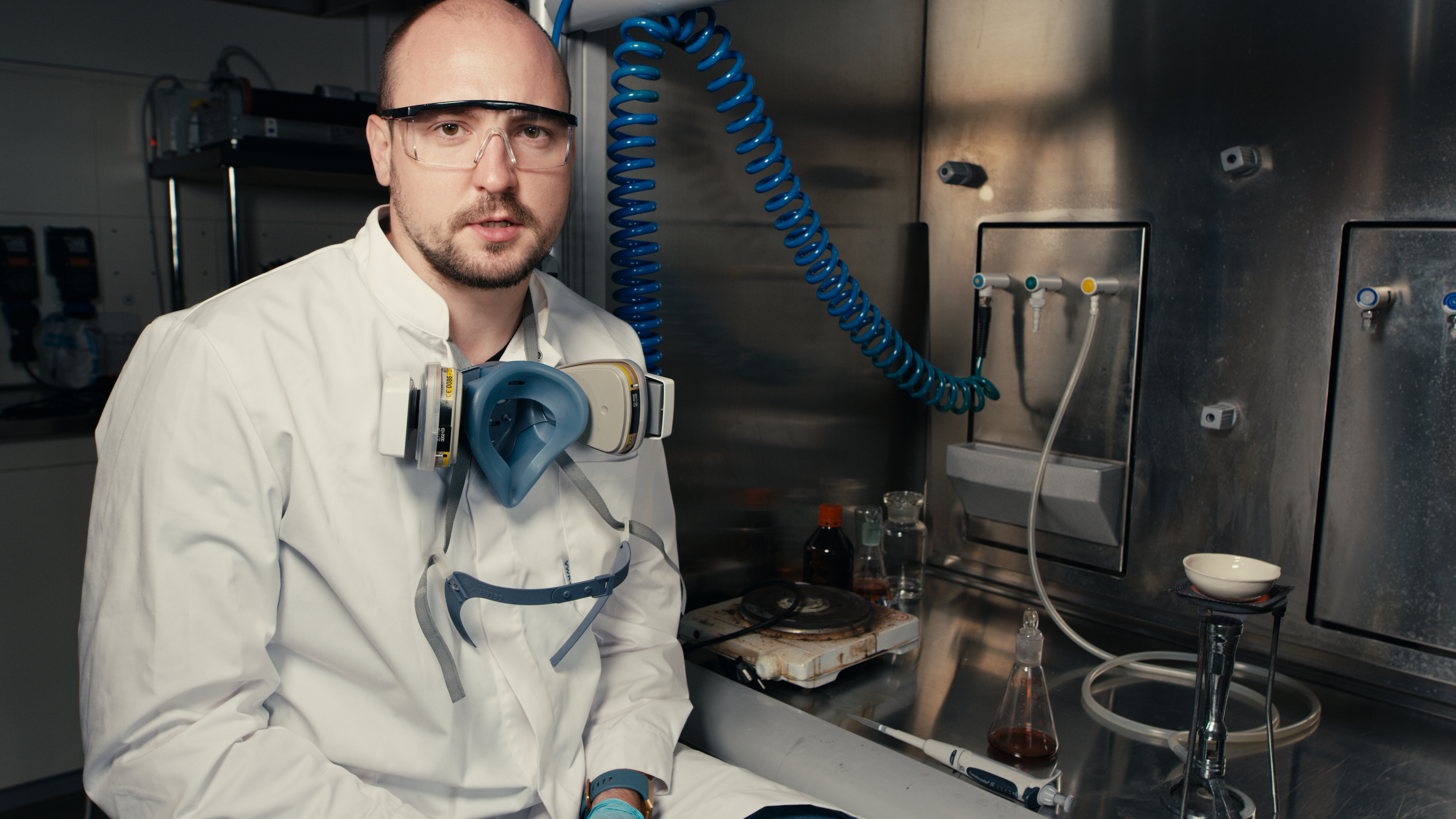 Sodium-ion battery researcher Ronald Väli preparing cathode material in a laboratory (illustrative photo)